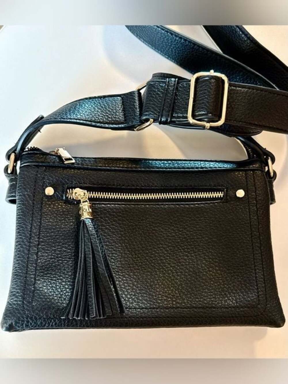 Women’s Black Crossbody Handbag. Gold detailing.